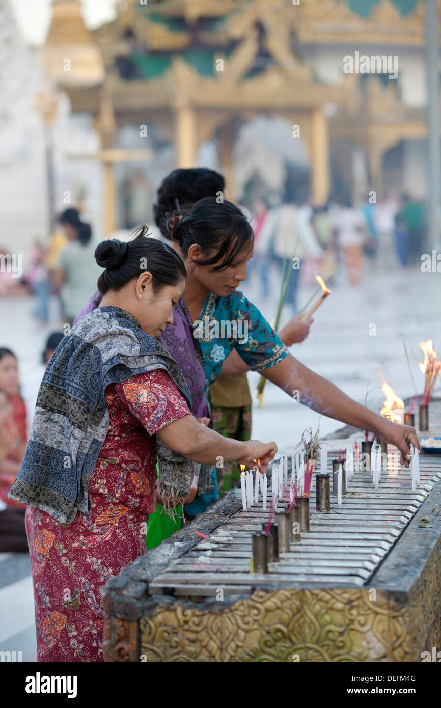 Devotees, Shwedagon pagoda, Yangon (Rangoon), Yangon Region, Myanmar (Burma), Asia Stock Photo