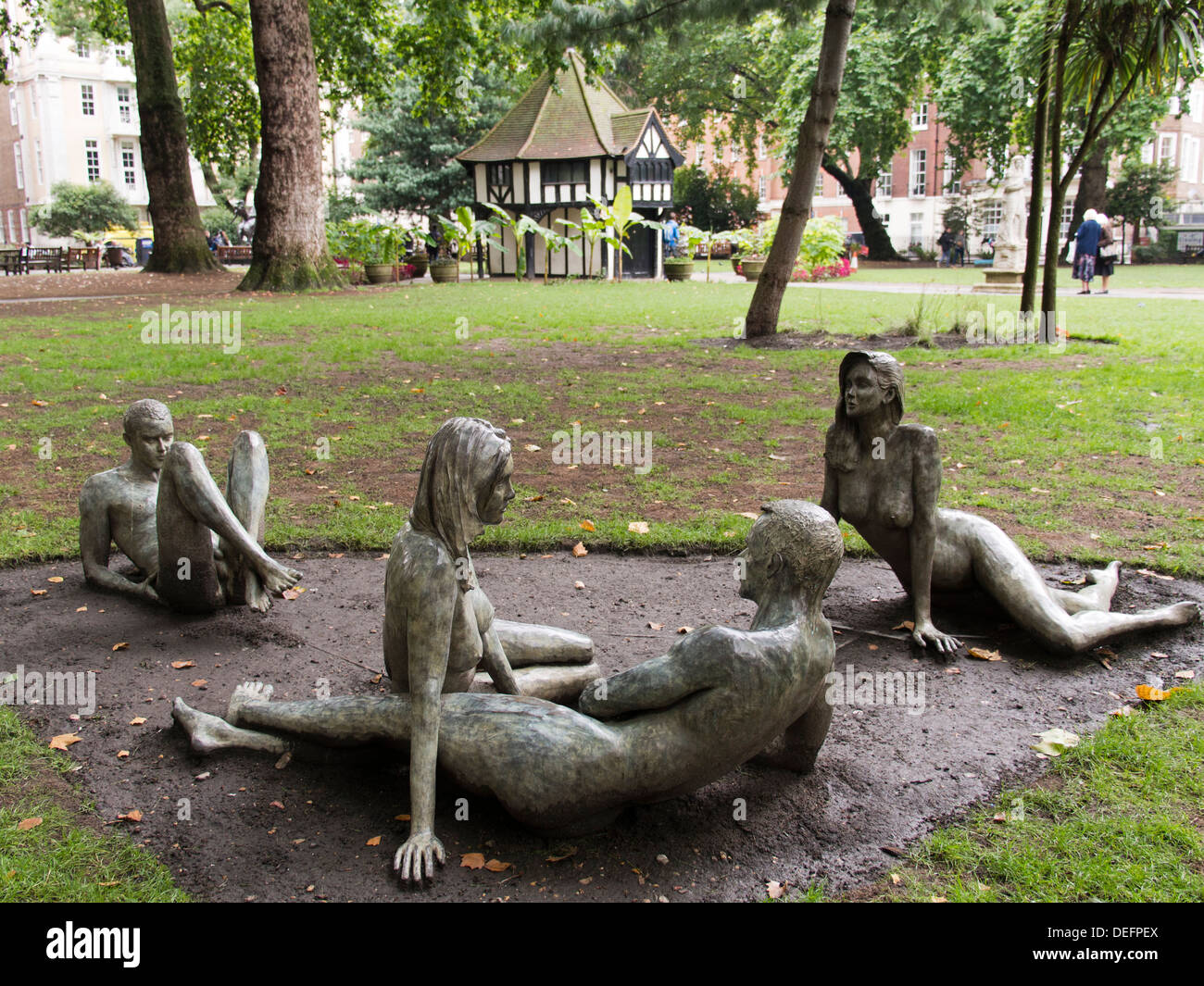 Sculpted group of figures by Bruce Denny in Soho Square, London 3 Stock Photo