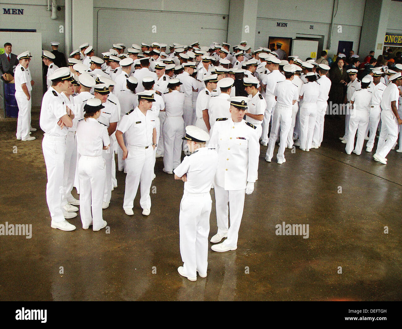 Midshipmen attending graduation at U.S. Naval Academy. Annapolis