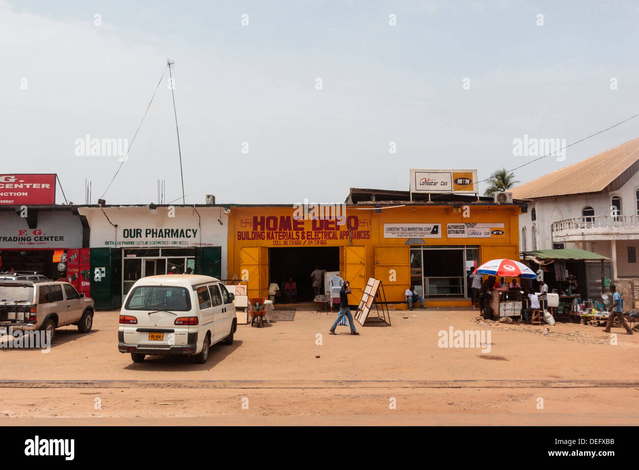 Africa, Liberia, Monrovia. Building materials store on roadside Stock Photo Alamy