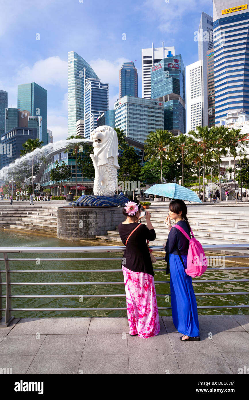 The Merlion Statue with the city skyline in the background, Marina Bay, Singapore, Southeast Asia, Asia Stock Photo