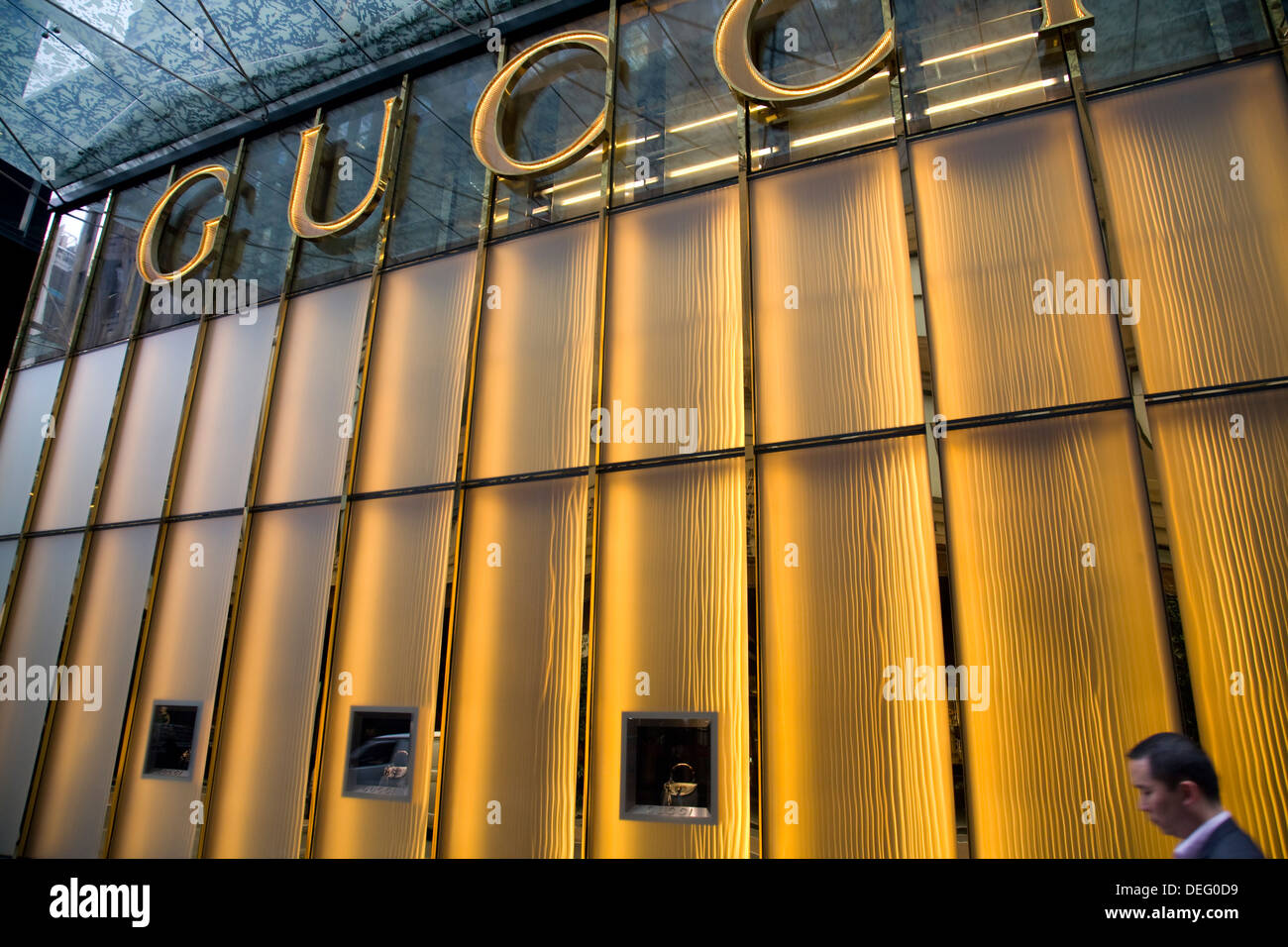 Exterior of Gucci store in Castlereagh street in Sydney city centre with characteristic gold coloured shopfront, Sydney city centre,NSW,Australia Stock Photo