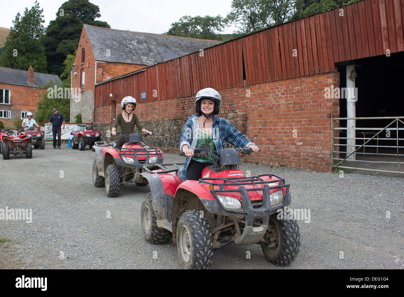 Fun on quad bikes Stock Photo Alamy