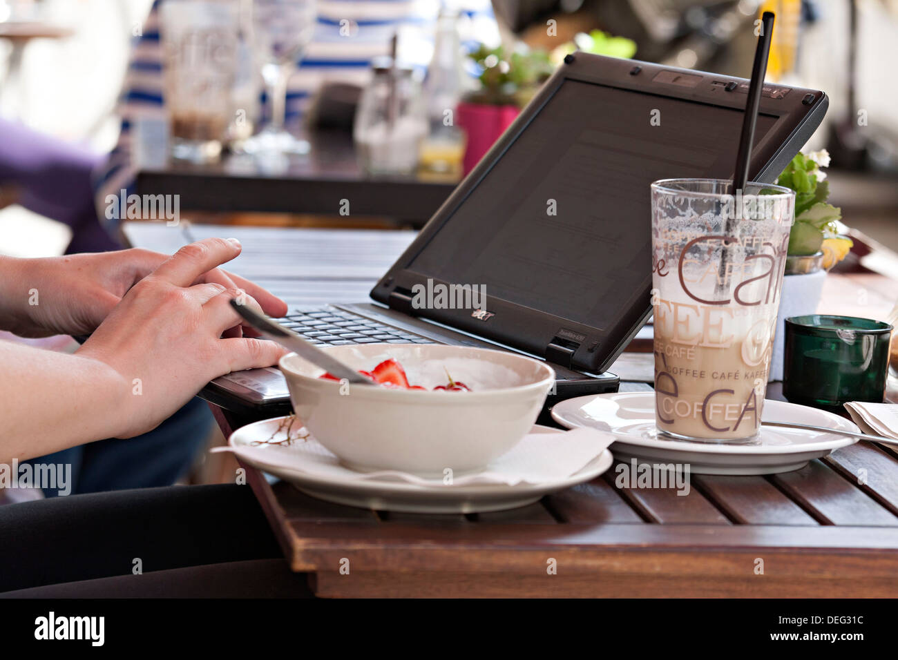 Using laptop tables hi-res stock photography and images - Alamy