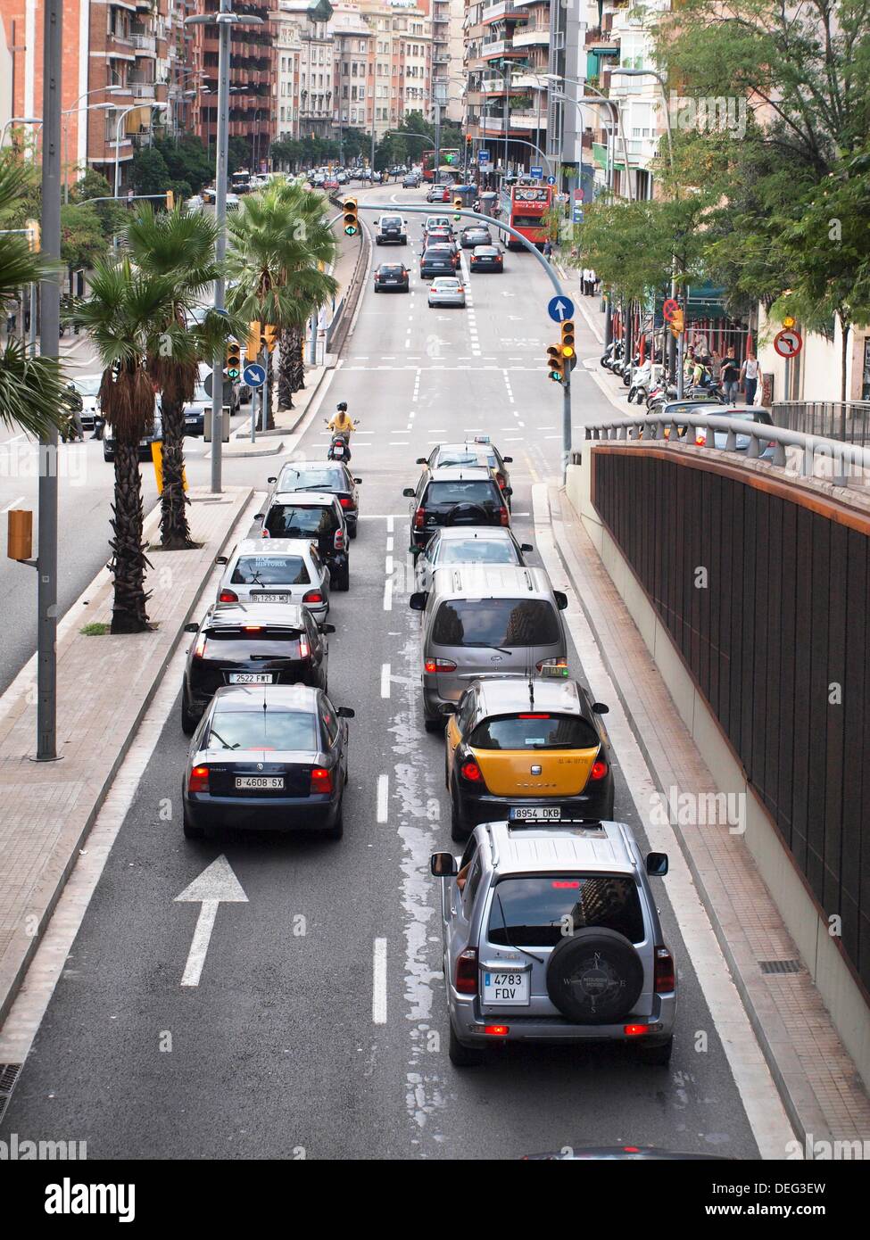 Traffic jam. Cars and motorcycles in Travessera de Dalt. Gràcia quarter