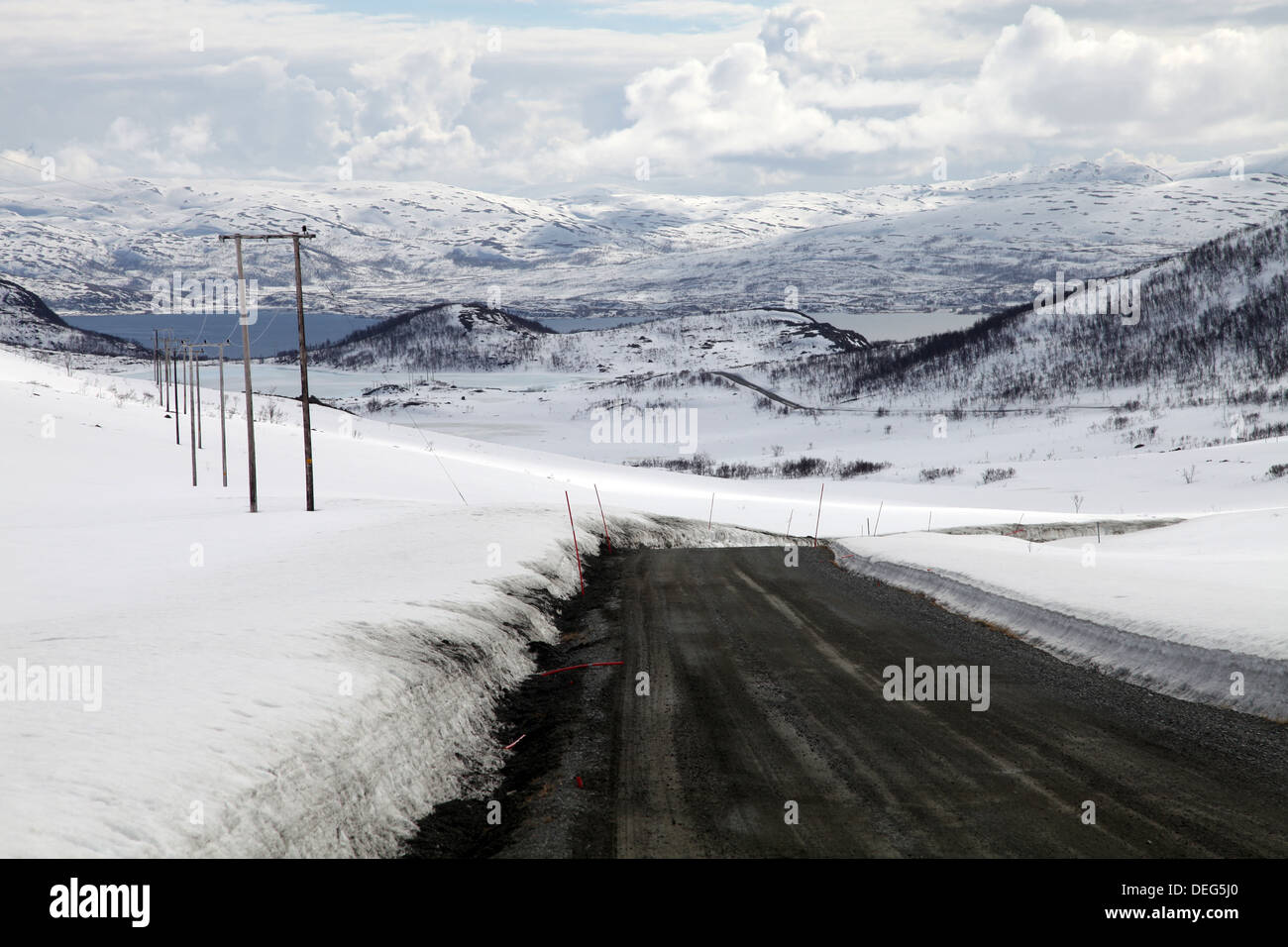 Mountain road in spring, Kvaloya (Whale Island), Troms, arctic Norway, Scandinavia, Europe Stock Photo