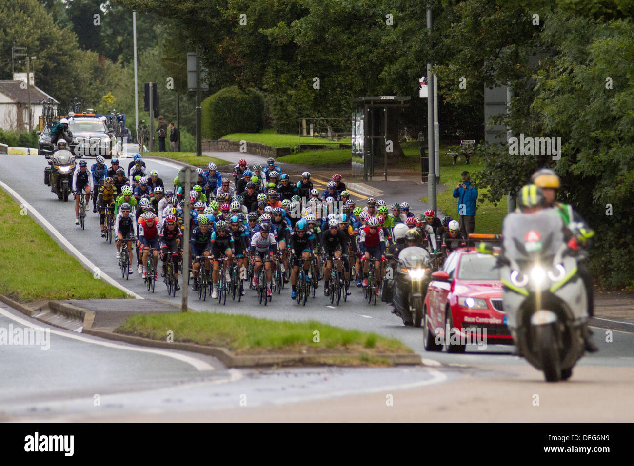 Stoke on Trent, Staffordshire, UK. 18th Sep, 2013. Cyclists pass through the Trentham area of Stoke on Trent, Staffordshire on stage 4 of the Tour of Britain, starting in Stoke on Trent and finishing in Llanberis in Wales. Credit:  Alex Williams/Alamy Live News Stock Photo
