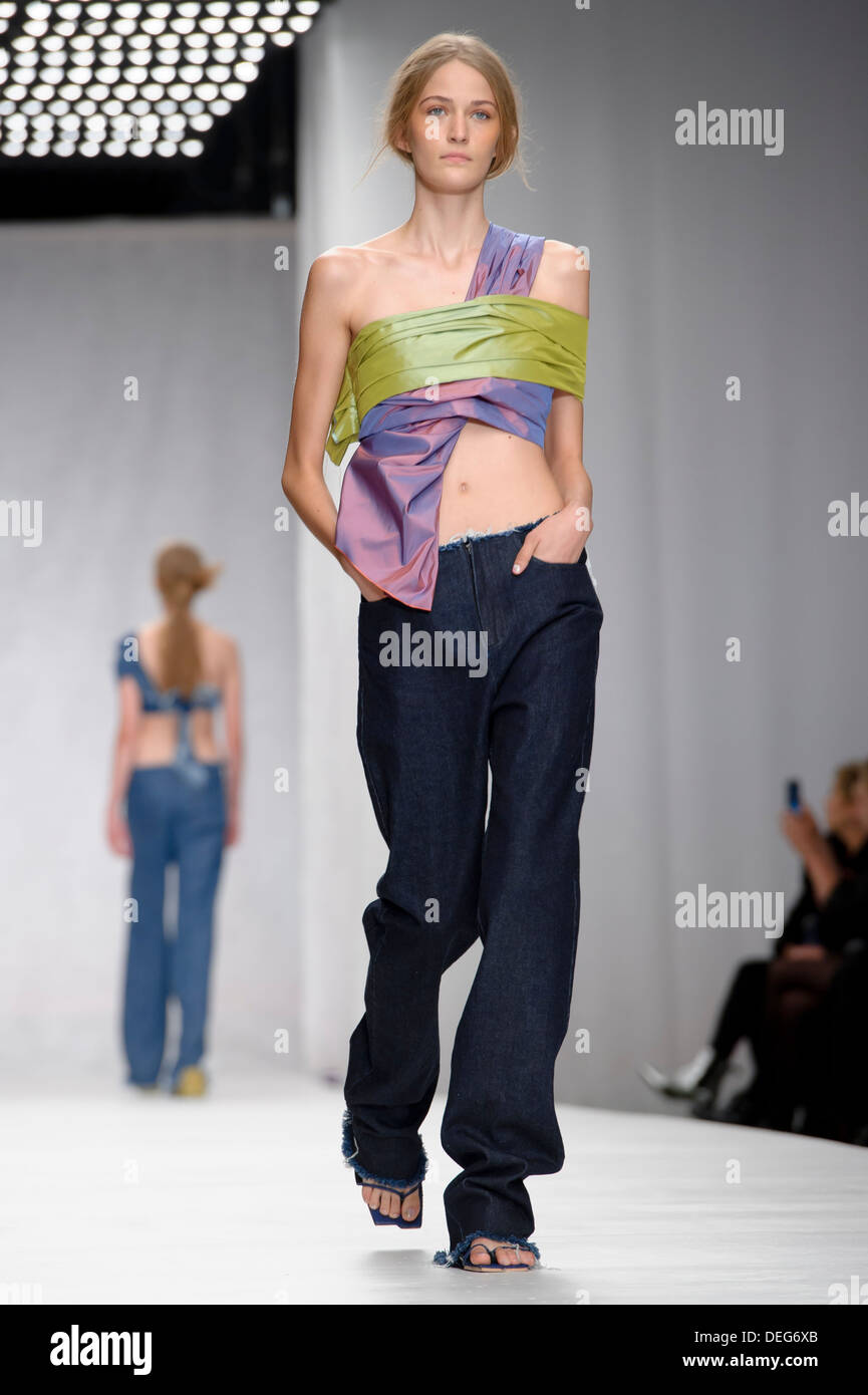 A model wears a design created by Marques'Almeida during London Fashion Week Spring/Summer 2014. Stock Photo