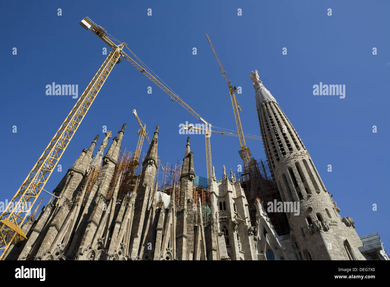Wide view of the Sagrada Familia with cranes. Barcelona, Catalonia, Spain. Stock Photo