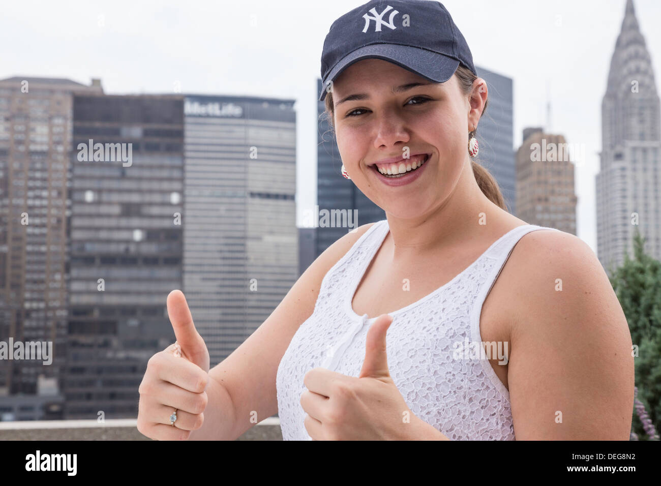 MLB Yankees Baseball Female Fan in Midtown Manhattan, NYC Stock Photo