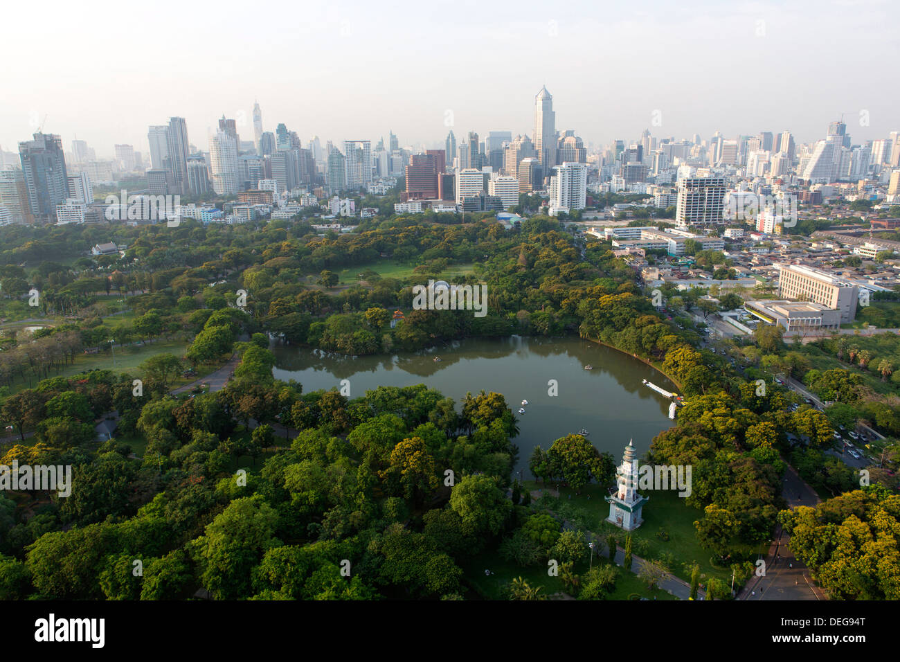 City skyline with Lumphini Park, the Green Lung of Bangkok, in the foreground, Sathorn Road, Bangkok, Thailand Stock Photo