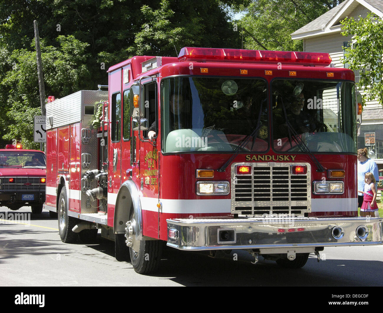 Current and vintage historic fire trucks at Independence Day parade