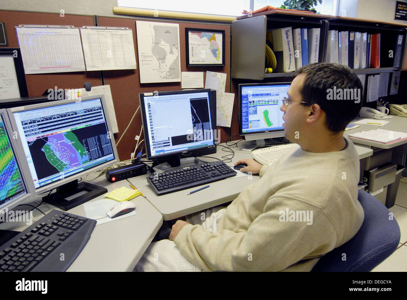 Meteorologist in Work Area in National Oceanic and Atmospheric