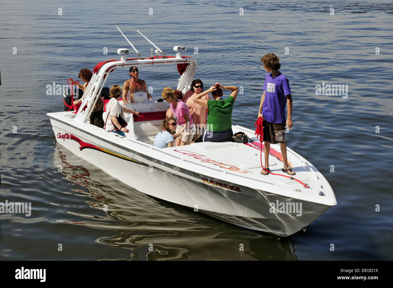 Family on boat outing on Bonita Bay at Bonita Springs Florida Stock