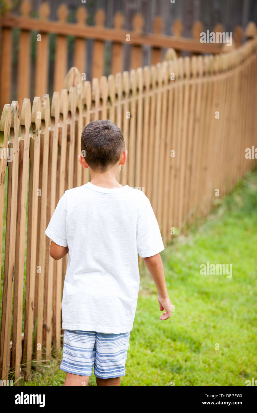 boy walking away Stock Photo