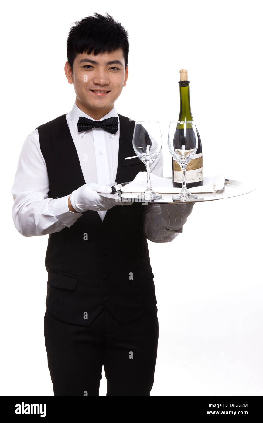 Waiter carrying silver tray hi-res stock photography and images - Alamy