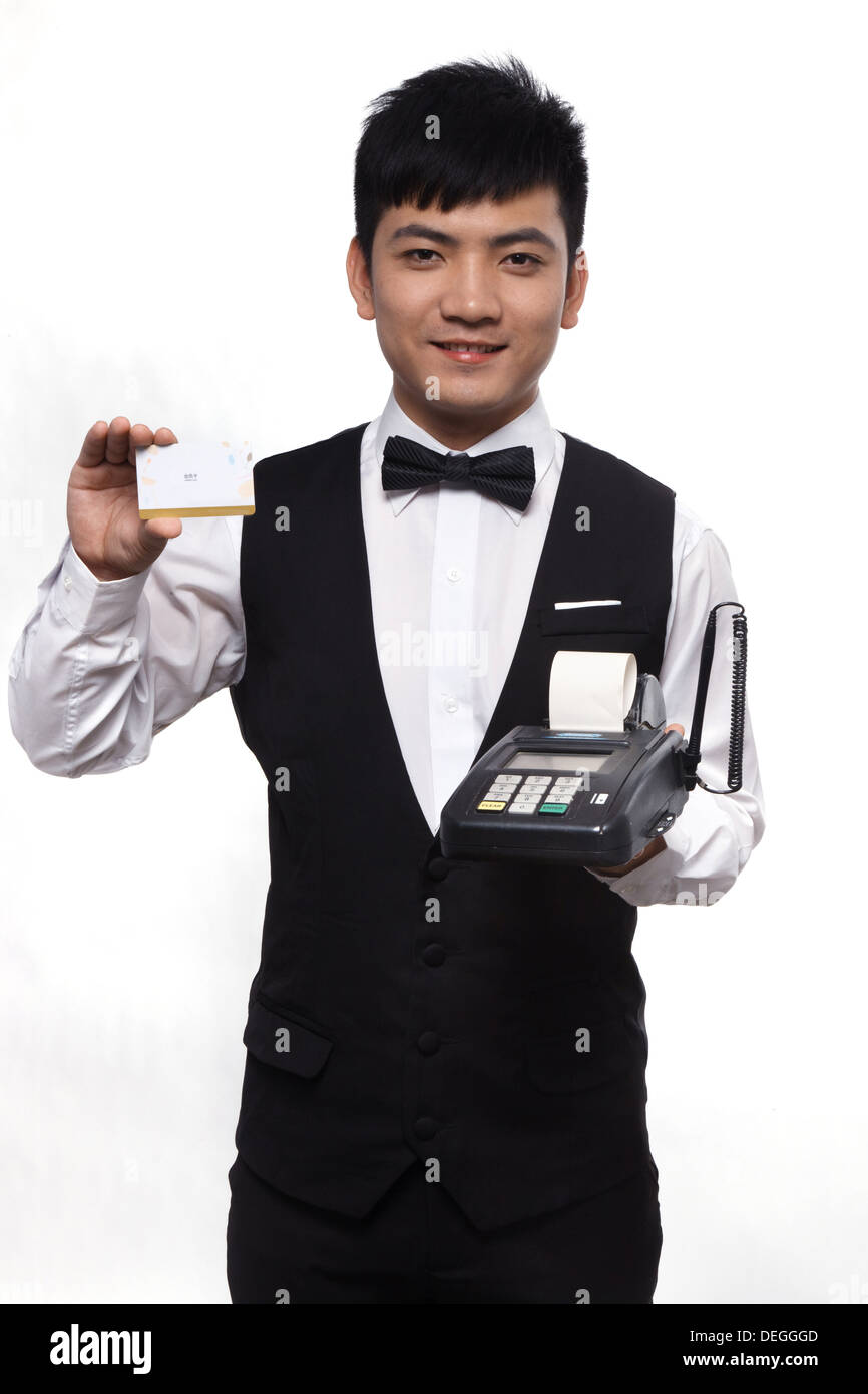 Waiter showing credit card reader hires stock photography and images