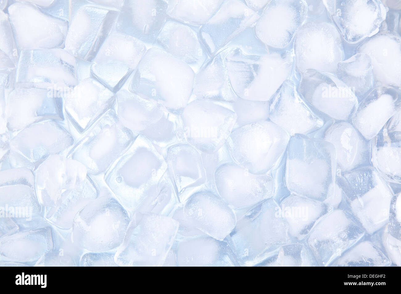 A cold color temperature ice cubes background. Stock Photo