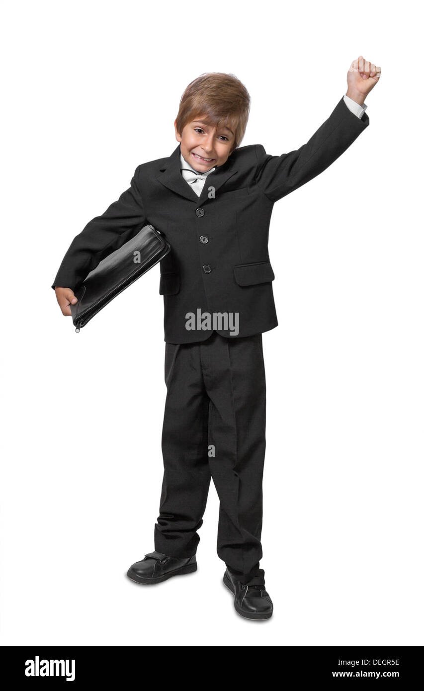 Boy in a tuxedo with a folder in hands. Isolate on white background Stock Photo