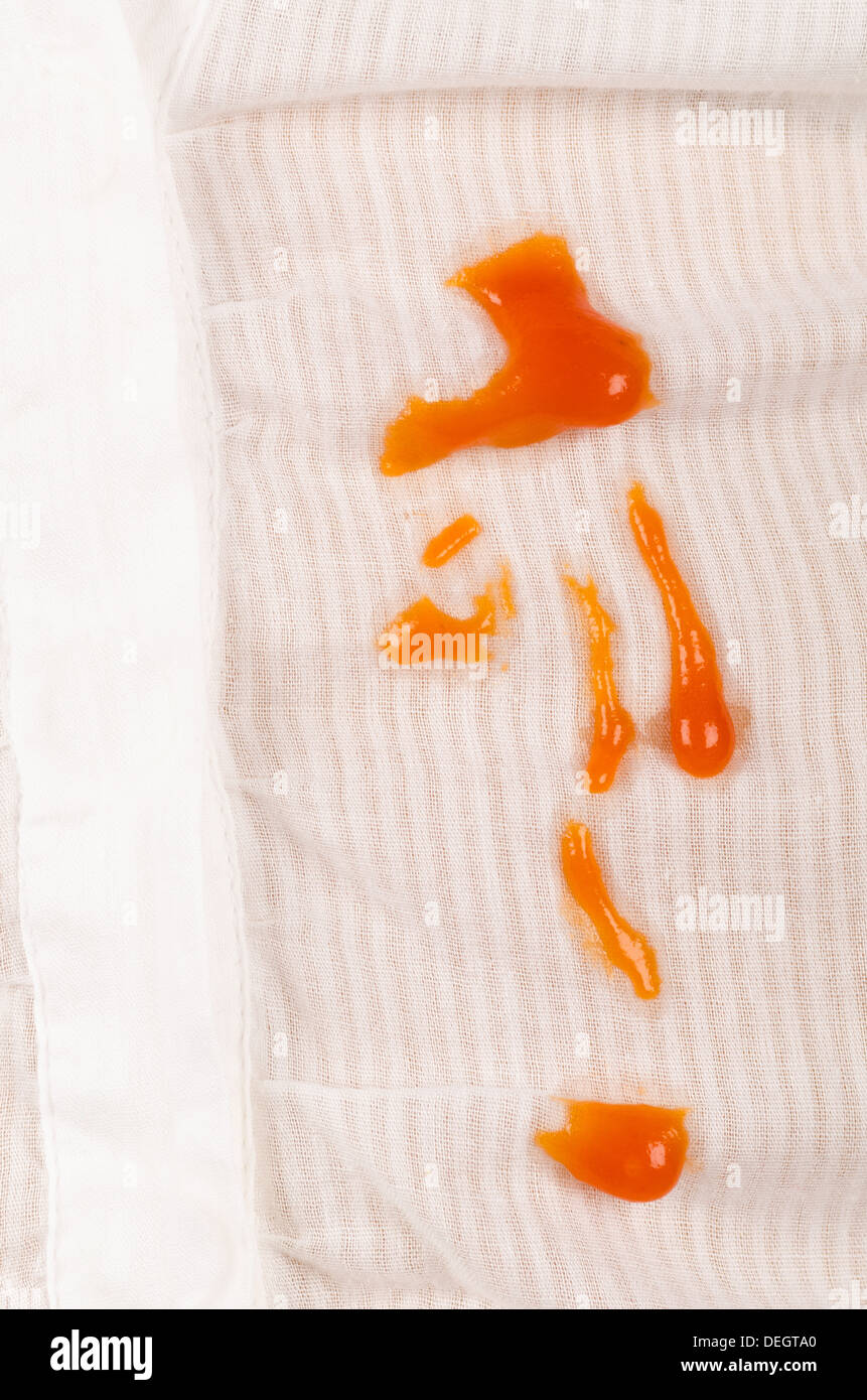 White cotton shirt with sauce spots on top Stock Photo Alamy