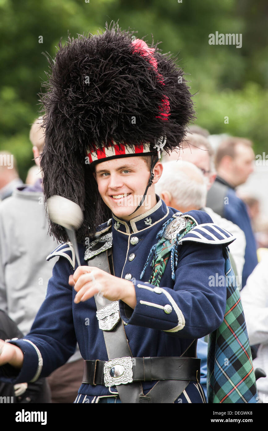 Drummer in Scottish marching band at the Lonach Highland Games in