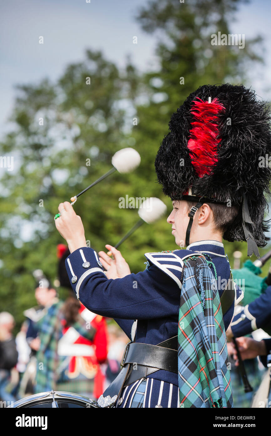 Drummer in Scottish marching band at the Lonach Highland Games in