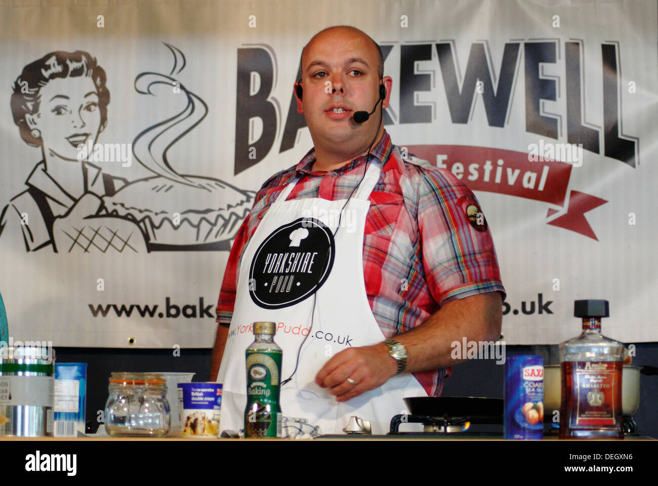 Yorkshire pudding champion, Christopher Blackburn gives a cookery demonstration at the inaugural Bakewell Baking Festival, 2013 Stock Photo