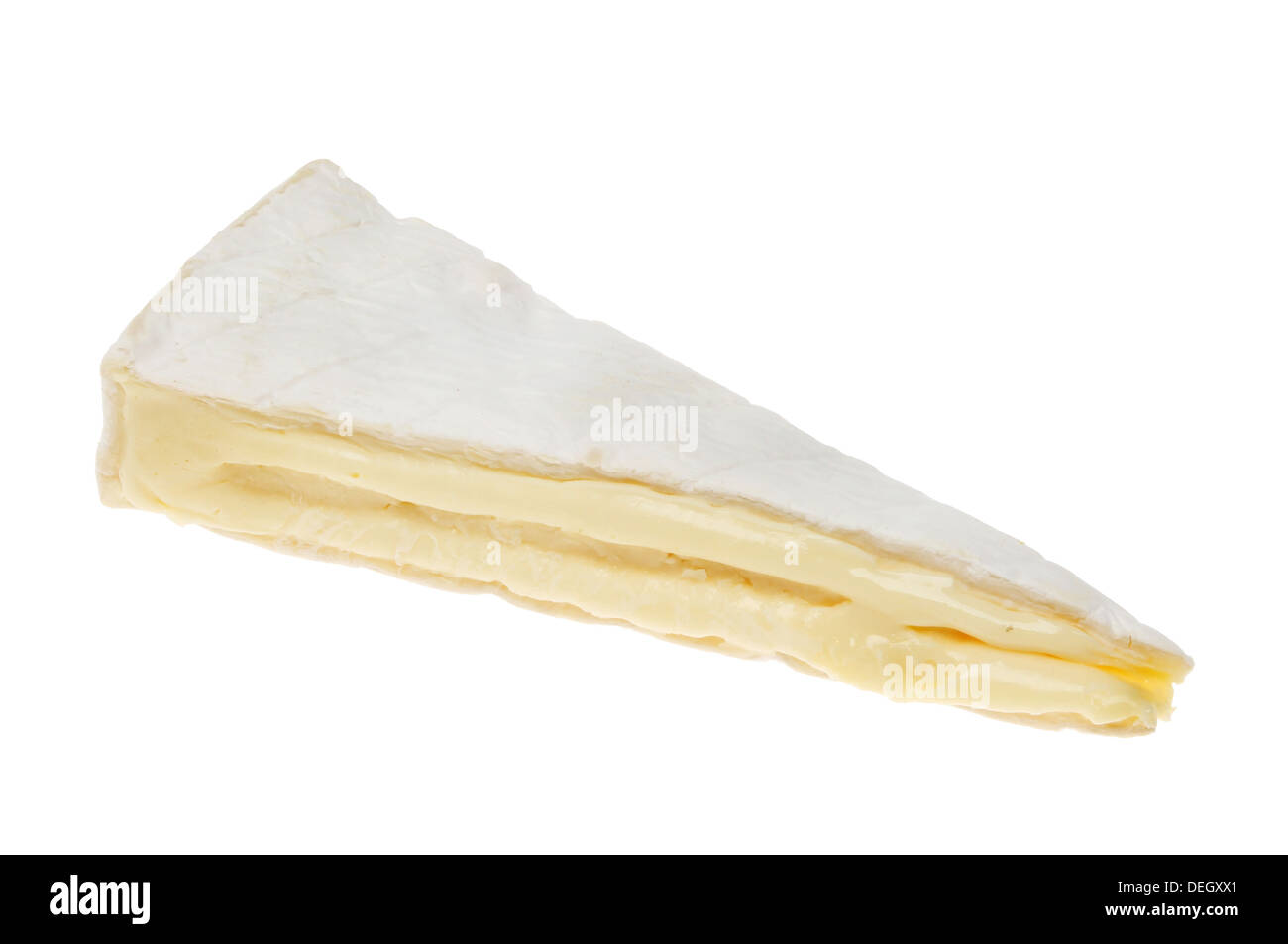 Wedge of ripe brie cheese isolated against white Stock Photo