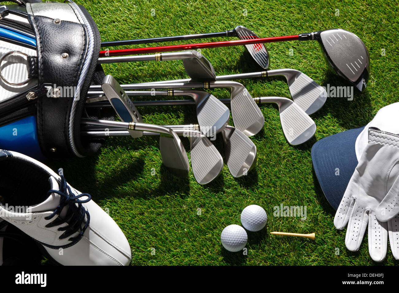 Golf clubs,shoes,balls,hat and glove Stock Photo - Alamy