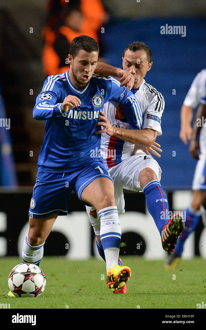 London, UK. 18th Sep, 2013. Chelsea's Oscar is fouled by Basel's Marcelo Díaz during the UEFA Champions League Group E match between Chelsea from England and Basel from Switzerland played at Stamford Bridge, on September 18, 2013 in London, England. Credit:  Mitchell Gunn/ESPA/Alamy Live News Stock Photo