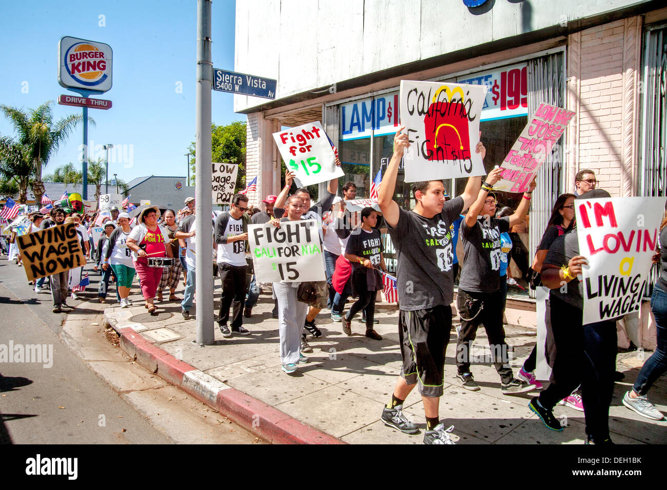 Demanding a $15 an hour wage, fast food workers demonstrate for better pay outside a Burger King in Los Angeles. Stock Photo