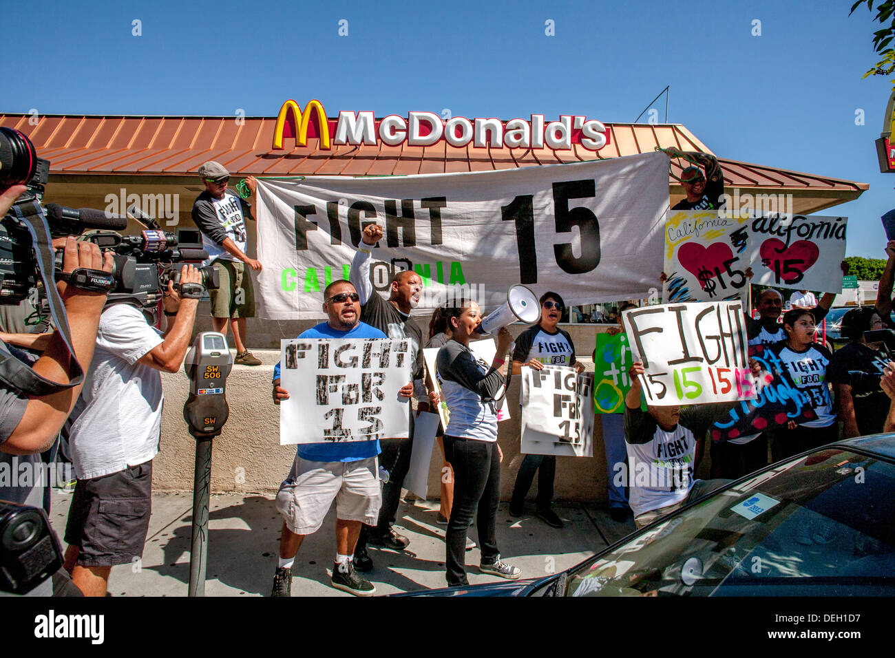 Fast food workers gather to protest their low minimum wages and demand