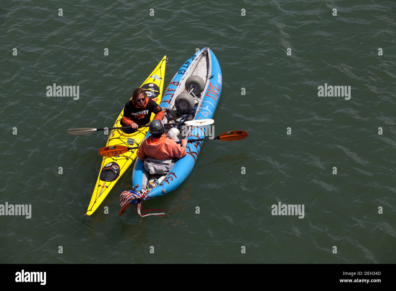 Two kayakers chatting outside the AT&T Park, San Francisco, California, USA. Stock Photo