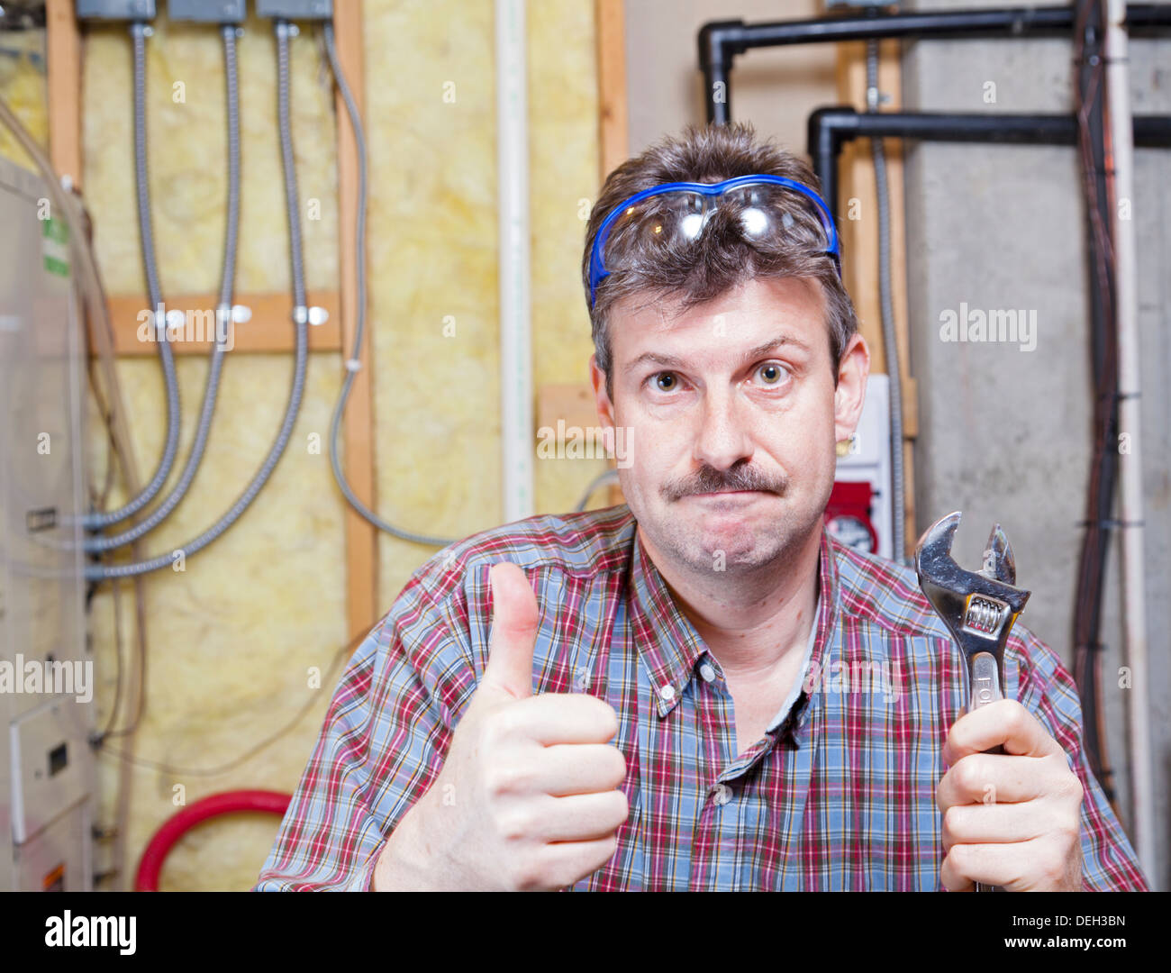 Happy handyman Stock Photo