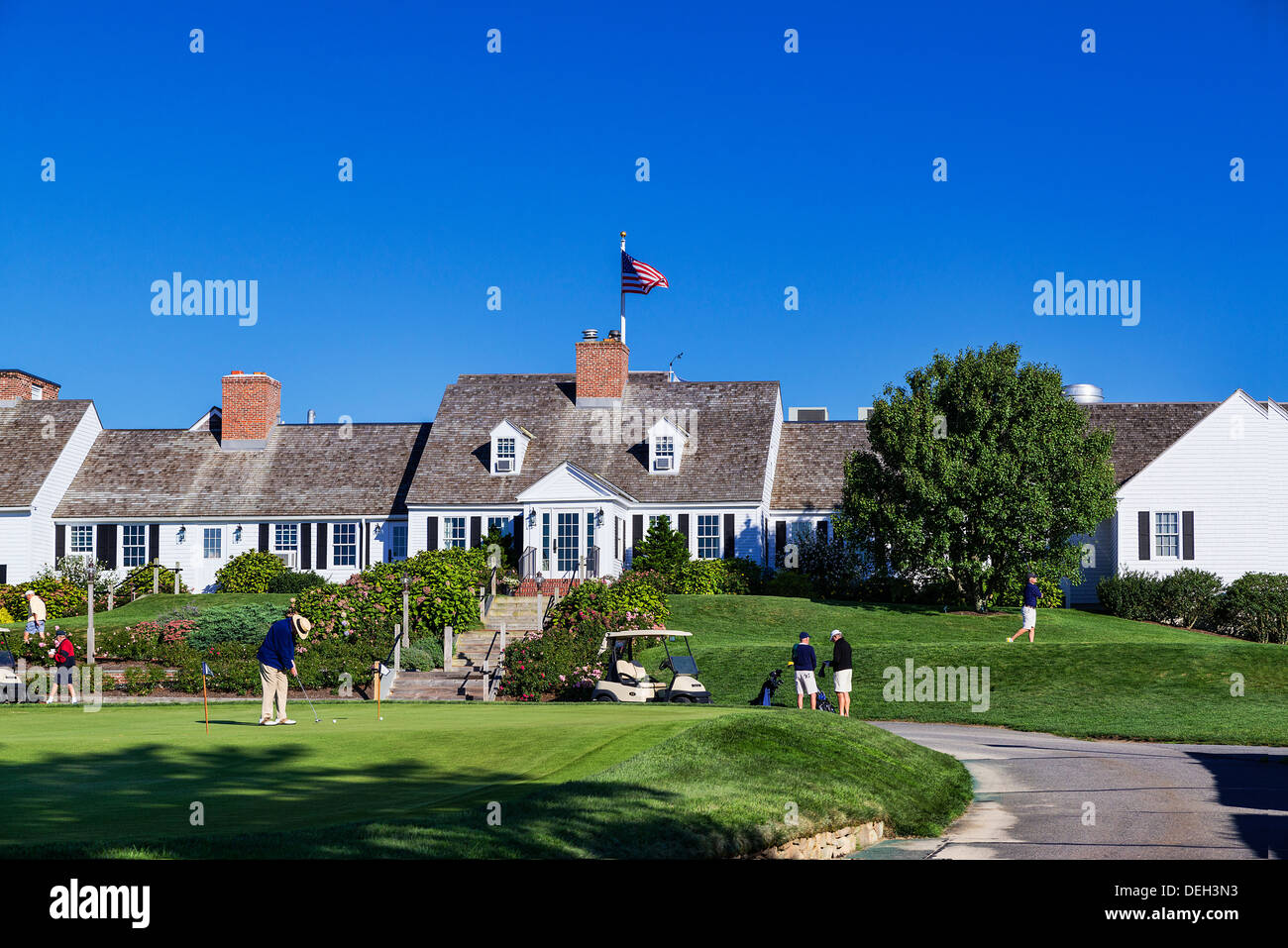 Golf course club house, practice green and tee off, Eastward Ho, Chatham, Cape Cod, Massachusetts, USA Stock Photo