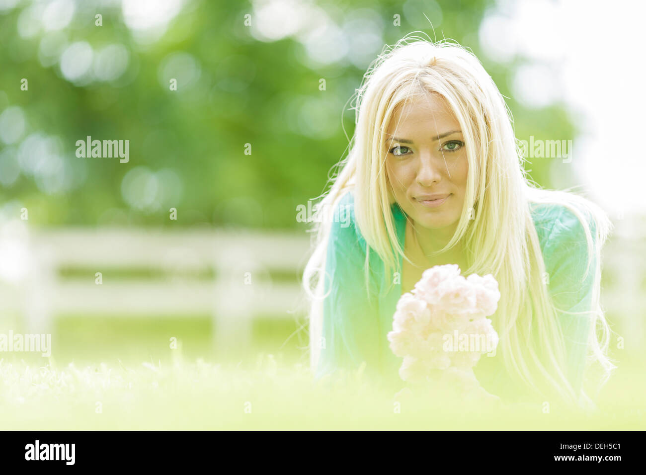 Young blond woman in the field Stock Photo