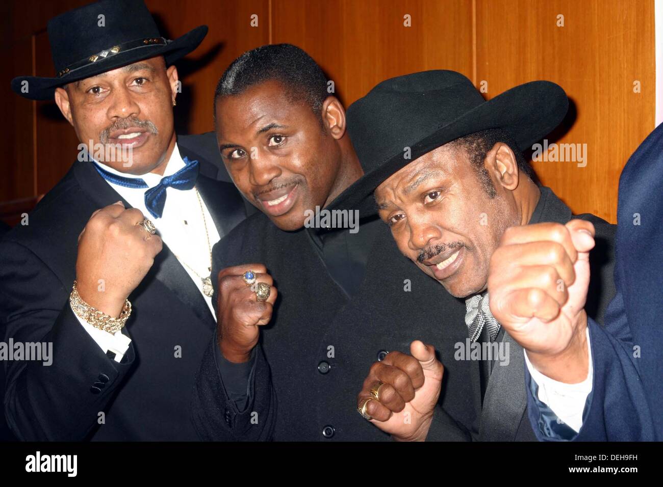 FILE PICTURES:  Kenneth Howard Norton Sr. (August 9, 1943 - September 18, 2013) was an American former heavyweight boxer and former WBC world Heavyweight Champion. He was best known for his 12-round victory over M. Ali, when he famously broke Ali's jaw, on March 31, 1973, becoming only the second man to defeat a peak Ali as a professional. PICTURED: Oct 10, 2004 - New York, New York, U.S. - From left, KEN NORTON, MARVIS FRAZIER, and JOE FRAZIER arrives at the first annual black tie gala F.I.S.T. Fights for New York. Credit:  Mitchell Levy/Globe Photos/ZUMAPRESS/Alamy Live News Stock Photo