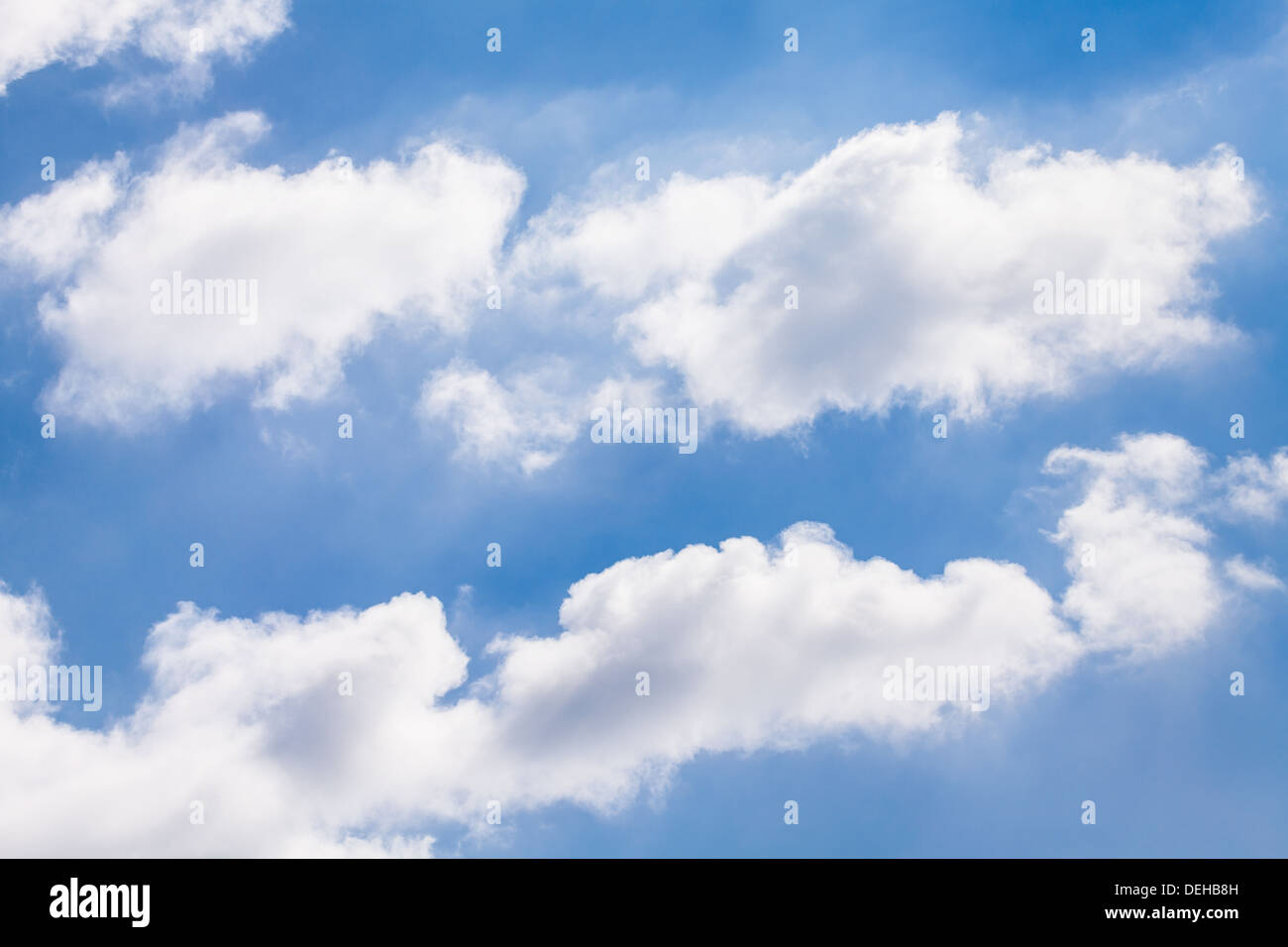 puffy clouds sky shiny atmosphere Stock Photo