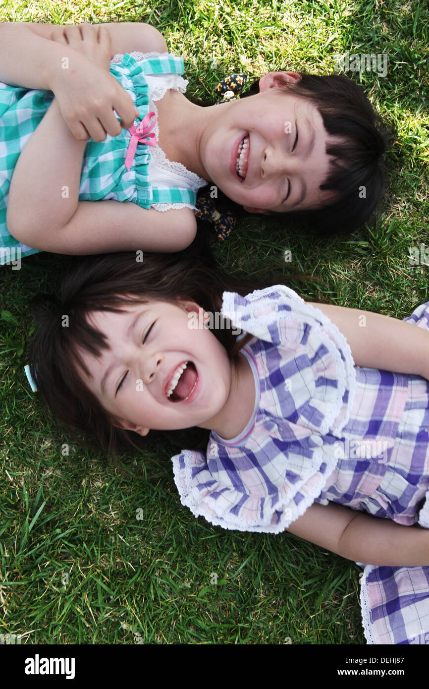 Children lying down shadow hi-res stock photography and images - Alamy