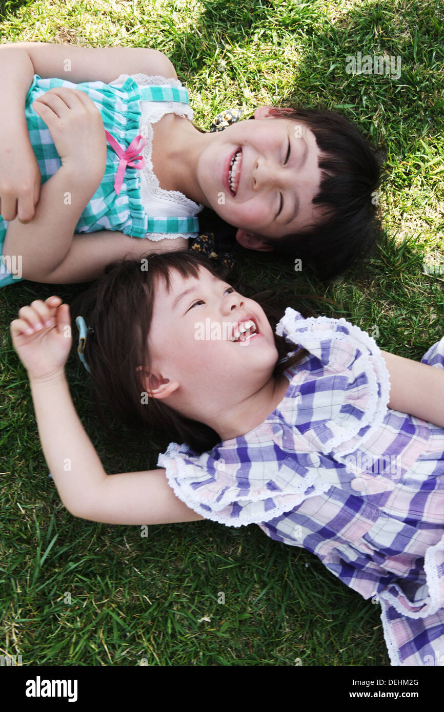 Children lying down shadow hi-res stock photography and images - Alamy