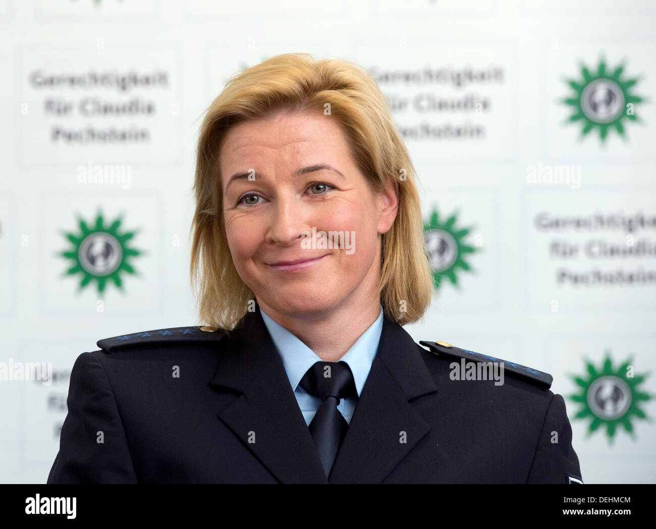 Olympic ice speed skating gold medalist Claudia Pechstein talks during