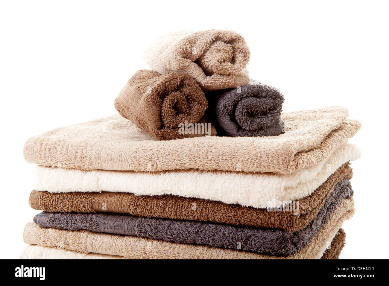 Pile of towels over white background Stock Photo - Alamy