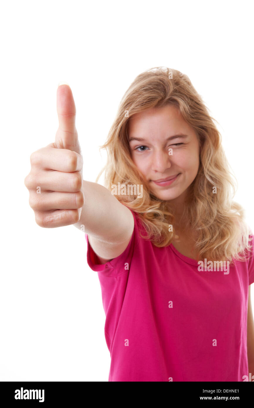 Girl with thumbs up isolated on white background Stock Photo