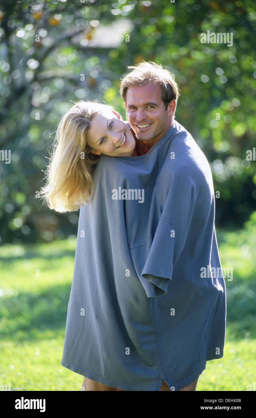 couple in an oversized shirt Stock Photo - Alamy