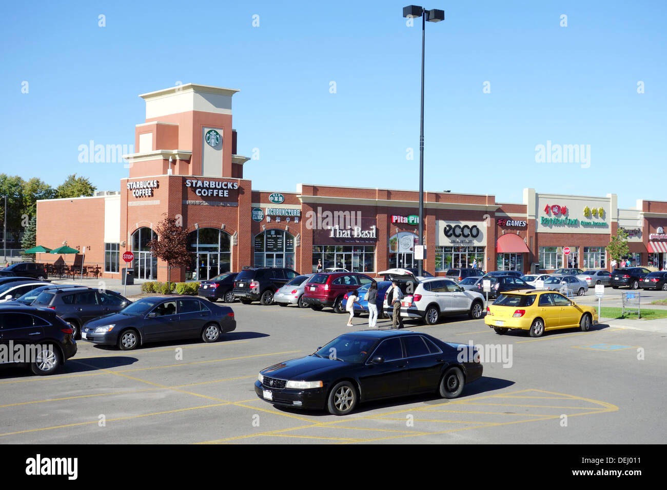 Strip mall parking lot outside Toronto, Canada Stock Photo - Alamy