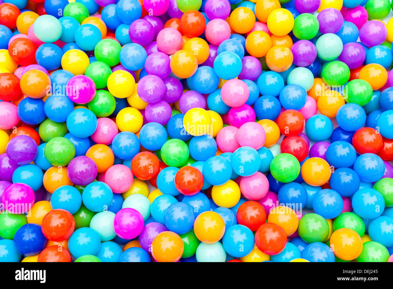 Hundreds of colorful plastic multi-colored balls Stock Photo - Alamy