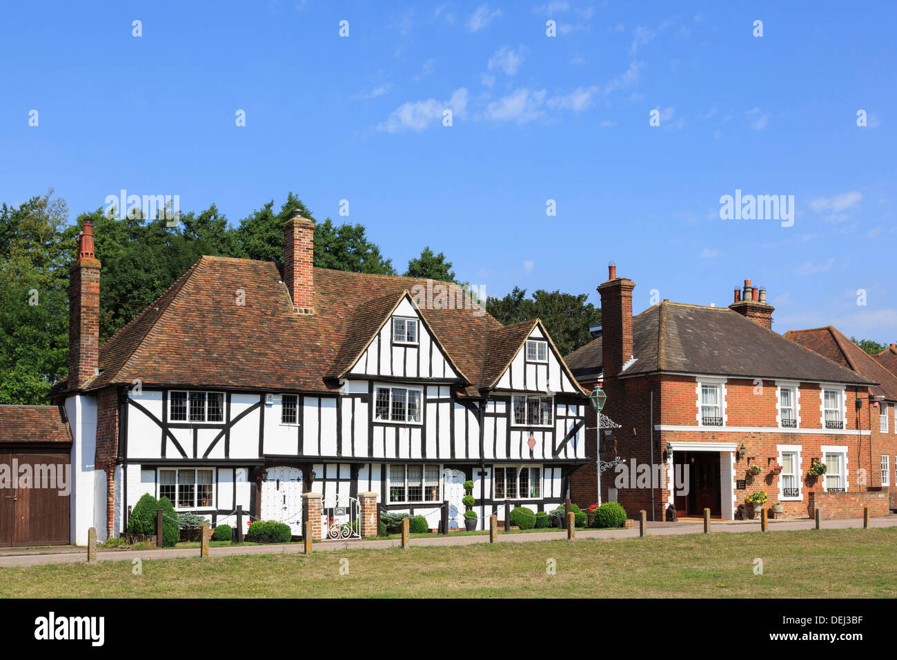 Timbered detached house overlooking picturesque village green in Stour Valley. Chartham, Kent, England, UK, Britain Stock Photo