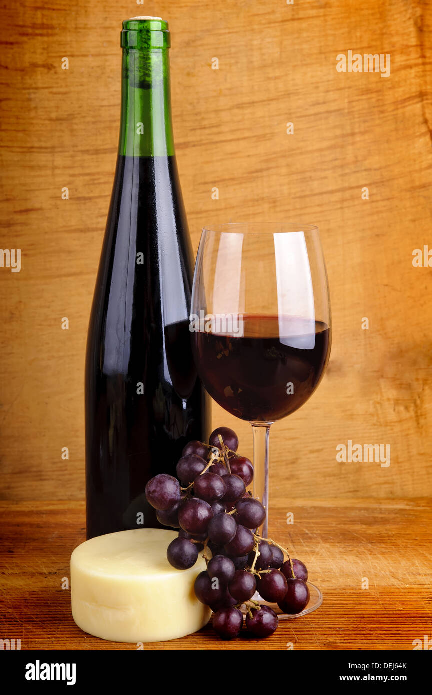 still life with red wine, cheese and grapes Stock Photo Alamy