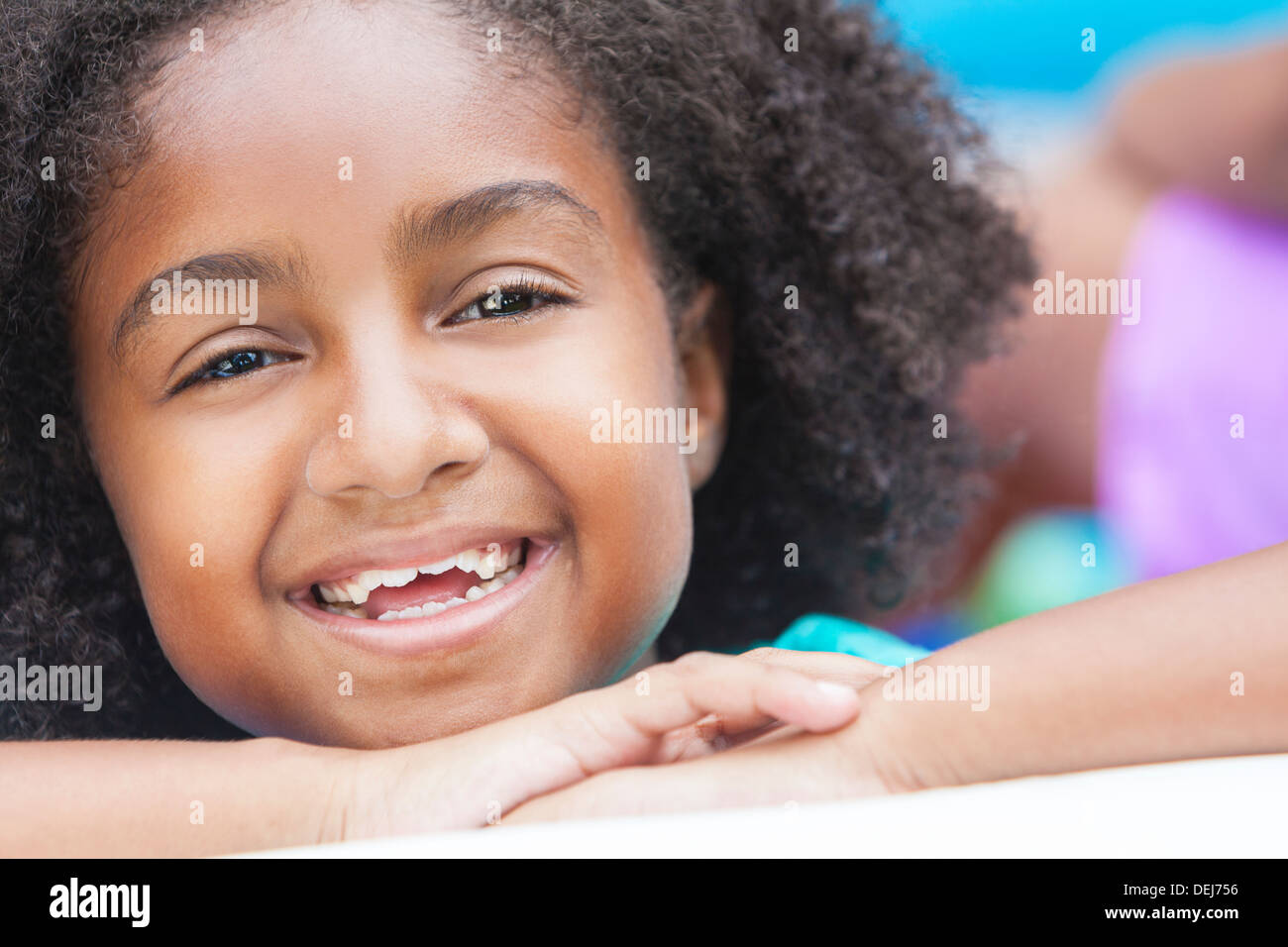 A cute, smiling & happy young African American girl Stock Photo - Alamy