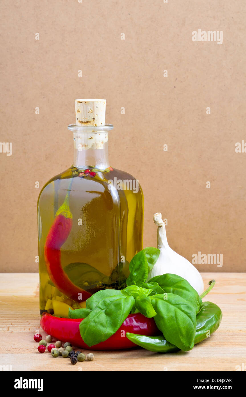 still life with infused olive oil with herbs and spices Stock Photo